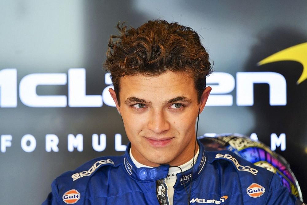 Lando Norris in McLaren gear, representing the team in Formula 1.